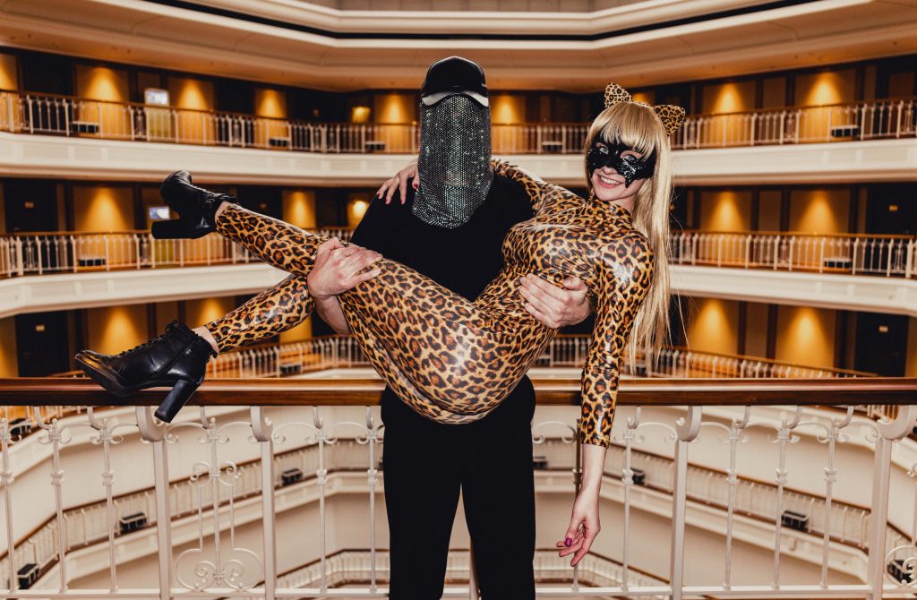Mr. Lingus carries Ana Lingus in his arms at the Westin Berlin during the Venus 2024 erotic fair.